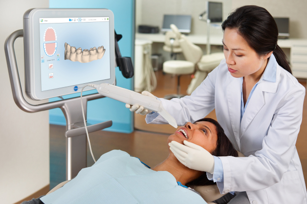 Orthodontic specialist scanning teeth